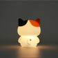 Oranje siliconen nachtlampje voor kinderen met zachte LED-verlichting, schattig en sfeervol kinderkameraccessoire van Creasowl