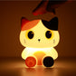 Oranje siliconen nachtlampje voor kinderen met schattig katontwerp, zacht LED-licht, perfect voor kinder- en babykamers.