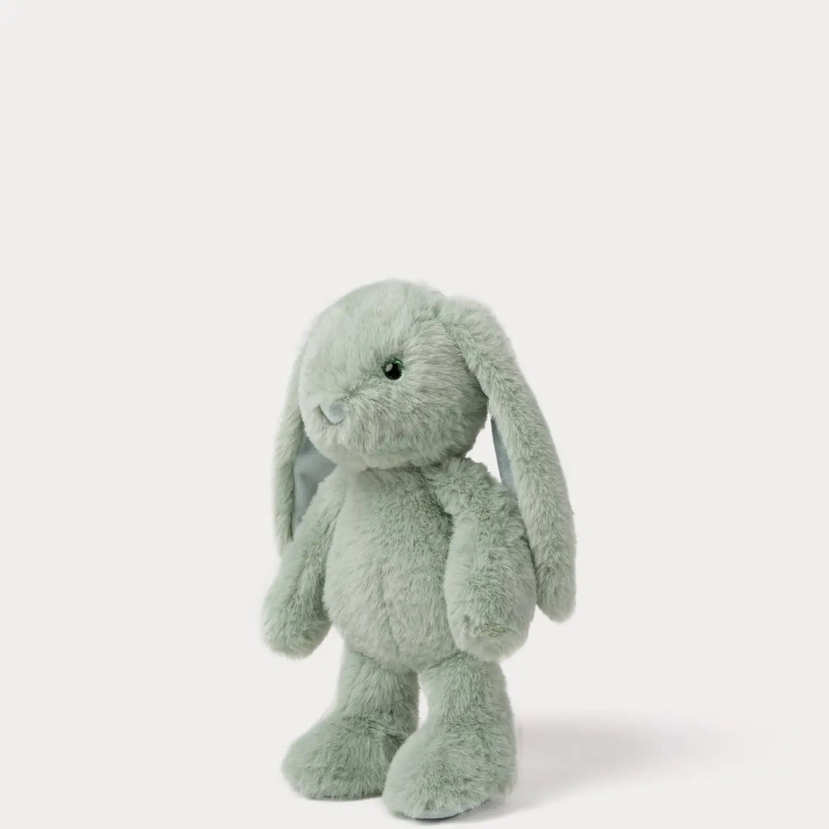 Zachte pluche knuffelkonijn Lily van Creasowl, 25 cm, met glitterogen en fluwelige textuur in diverse kleuren, liggend op een lichte achtergrond.