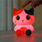 Oranje siliconen nachtlampje voor kinderen van Creasowl, zacht licht en schattig ontwerp voor in de kinderkamer.